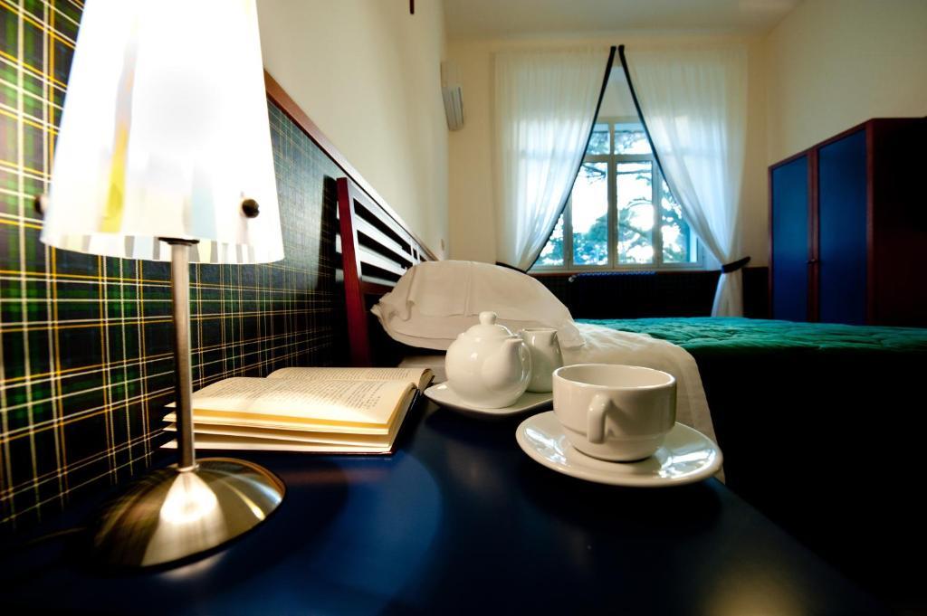 Hotel Villa Sturzo Кальтаджироне Номер фото